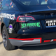 Image for article titled How A NASCAR Fan Got Sponsors To Buy Him A Tesla Model 3 With A Dale Earnhardt Tribute